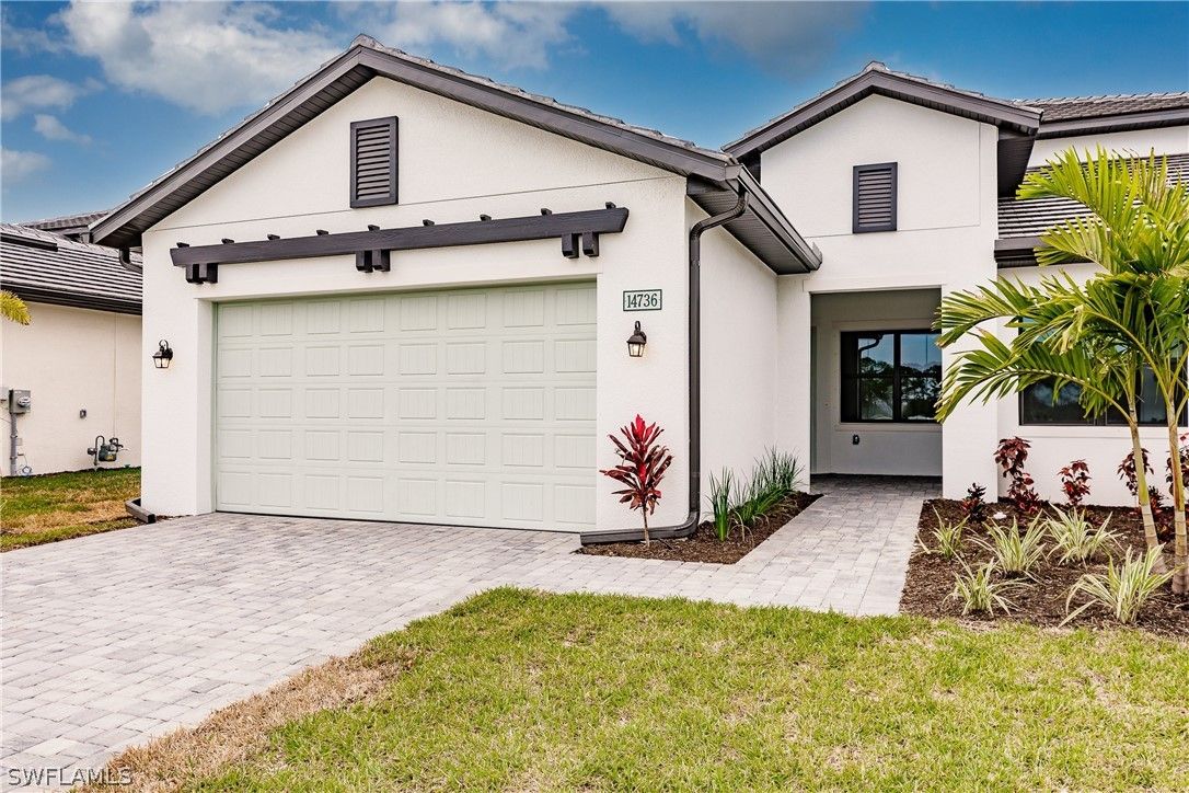 14736 Kingfisher Loop · Naples — exterior or signature view